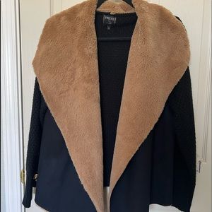 Black sweater with brown fur